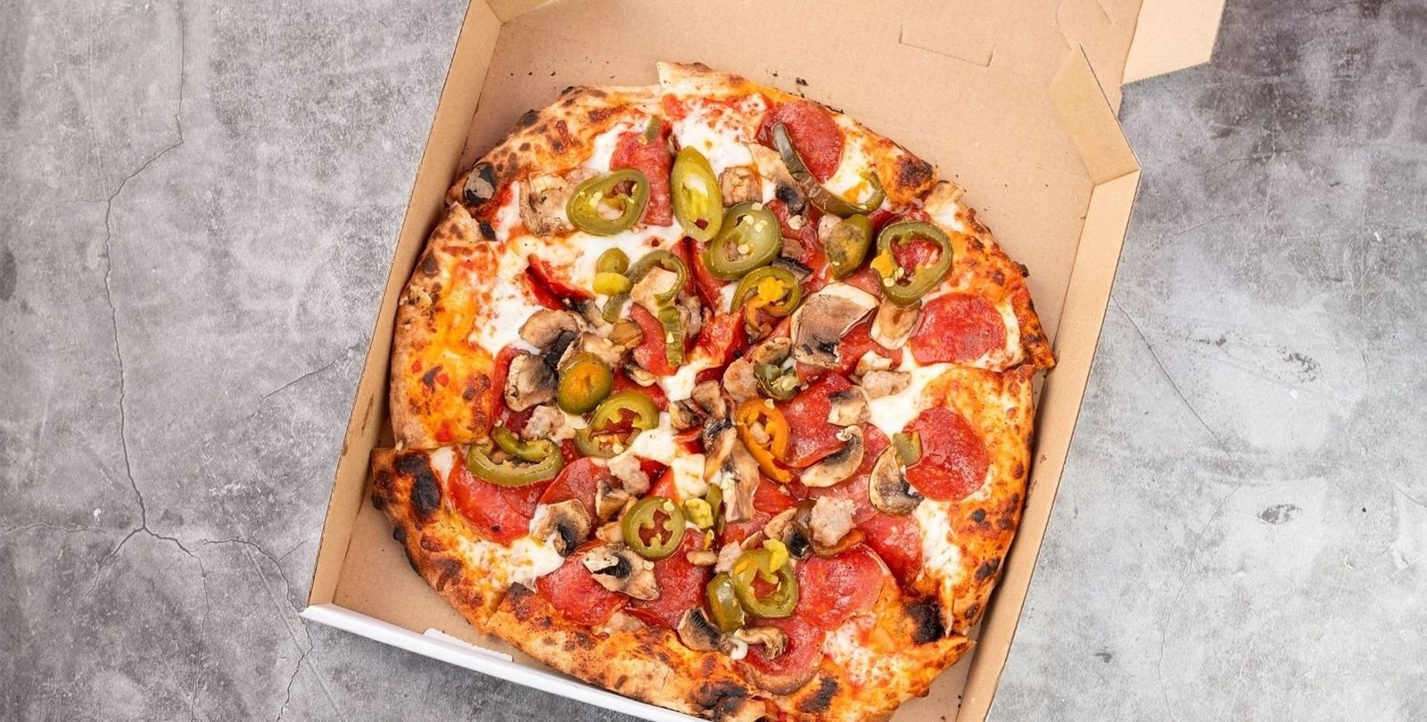 Fireball Pizza, pepperoni, jalapeño, sausage, mushroom